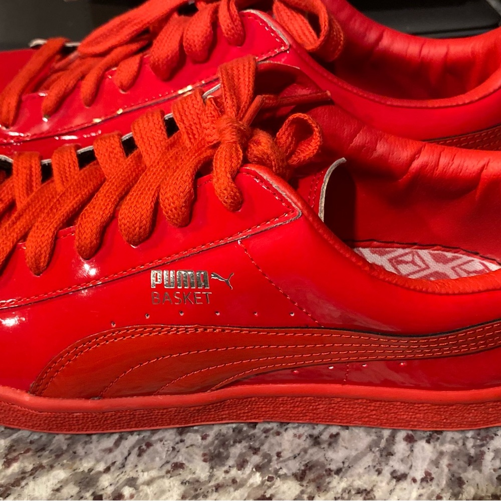 Selling a basically you pair of red Pattern leather  pumas
